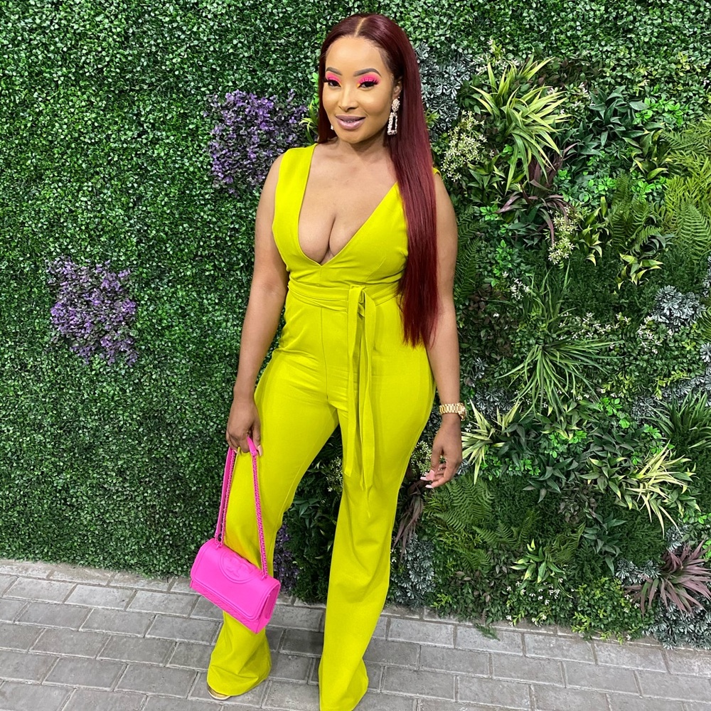 Green jumpsuit with belt